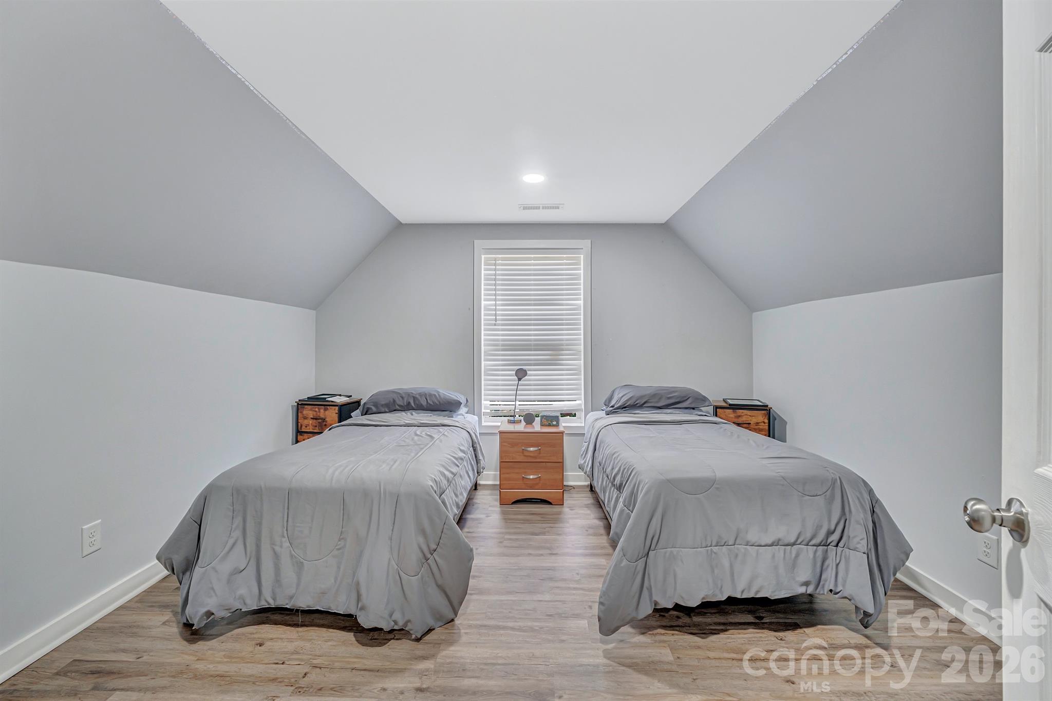 2538 Southside Road Lincolnton, NC 28092 - Photo 27 of 33 a bedroom with two beds and painting on the wall