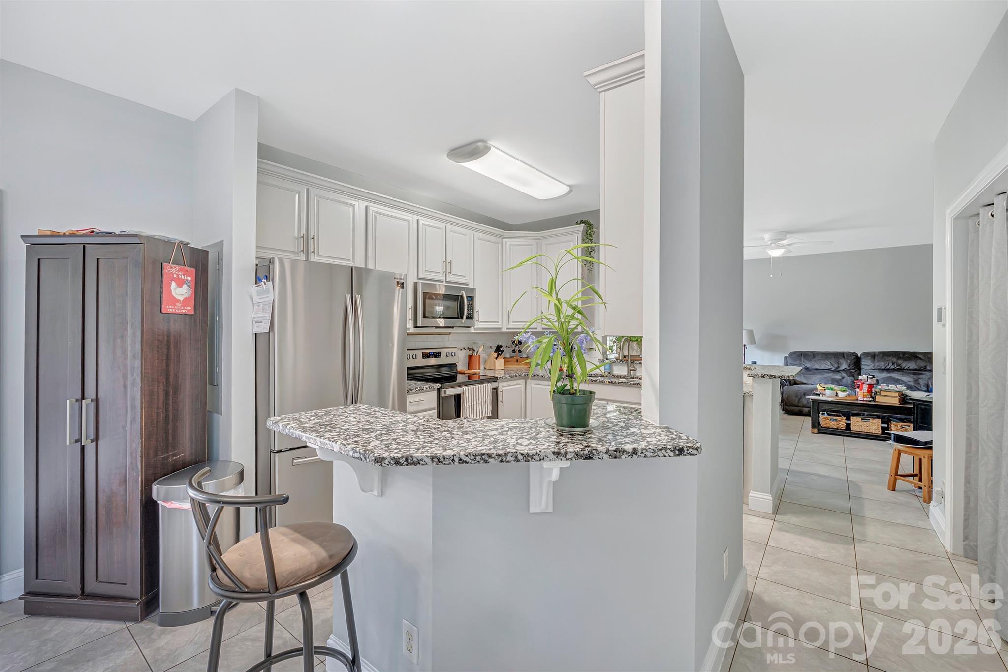 2538 Southside Road Lincolnton, NC 28092 - Photo 8 of 33 a kitchen with stainless steel appliances granite countertop a refrigerator and a stove
