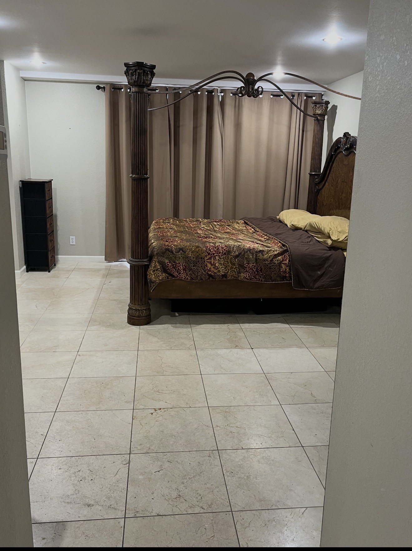 2016 Main Street, Unit 1708 Houston, TX 77002 - Photo 6 of 10 a bedroom with a bed and a black walk in closet