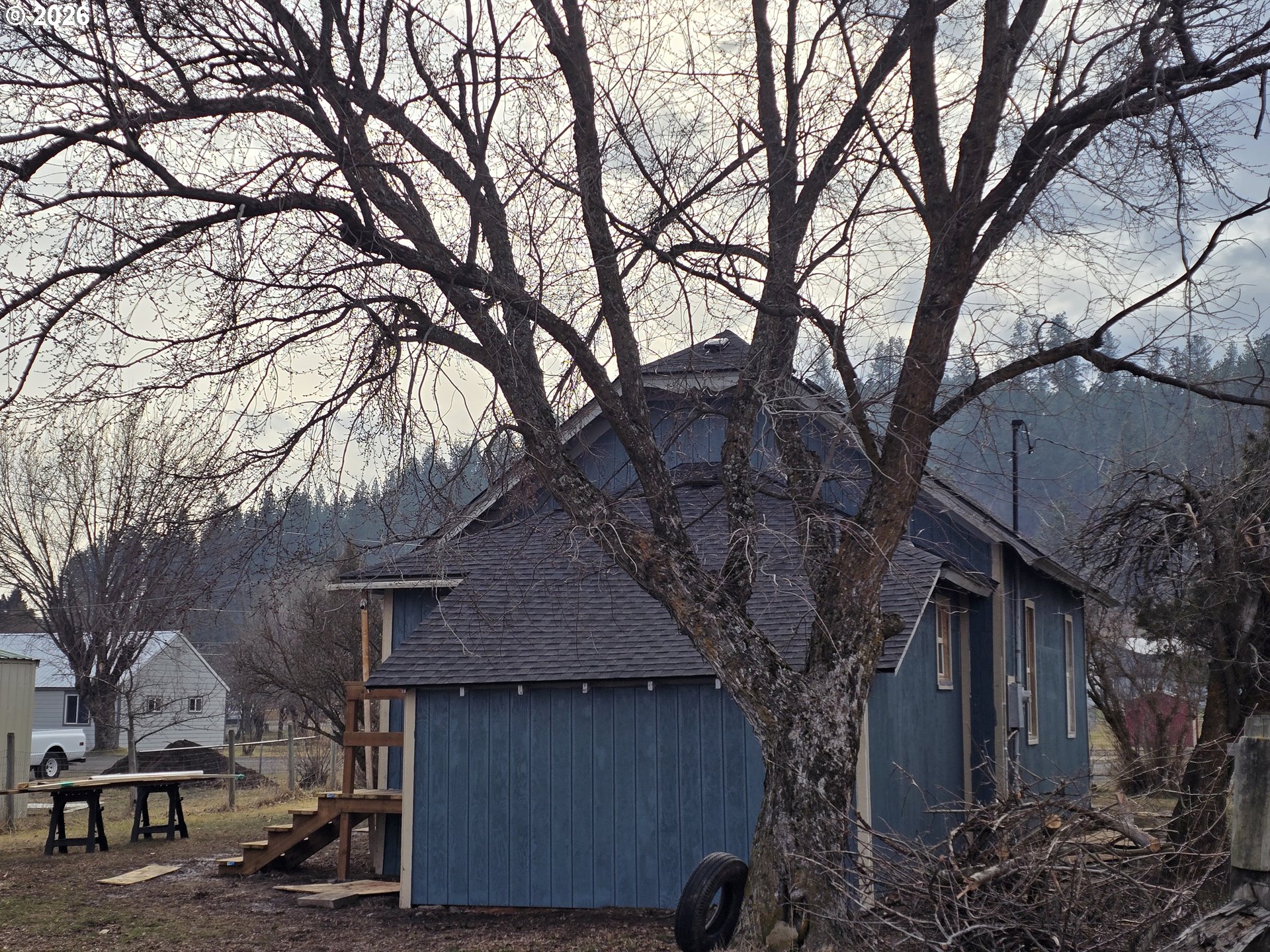 303 Donald Street Wallowa, OR 97885 - Photo 2 of 9 a view of a house with a tree