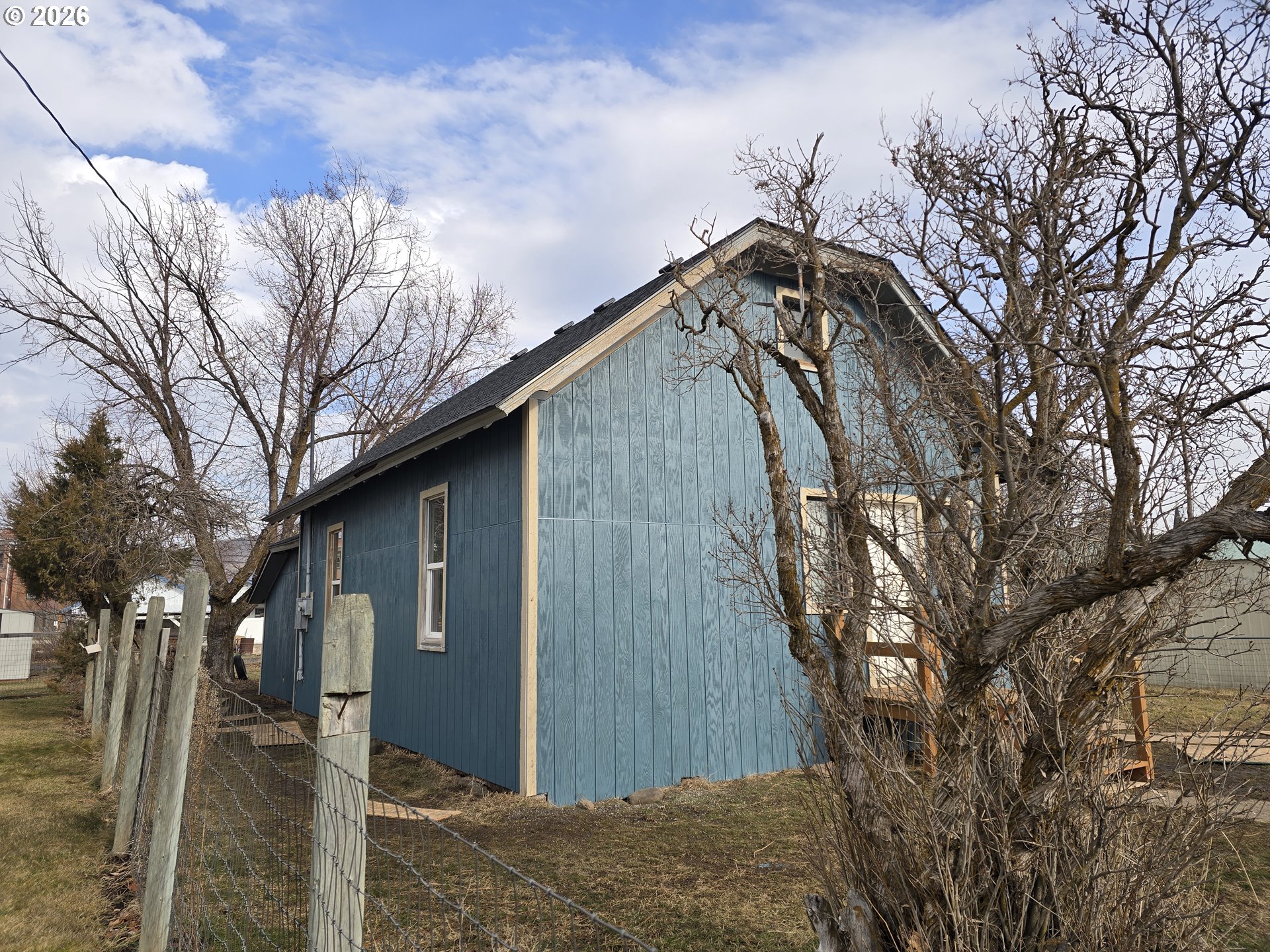 303 Donald Street Wallowa, OR 97885 - Photo 4 of 9 a backyard of a house with lots of green space