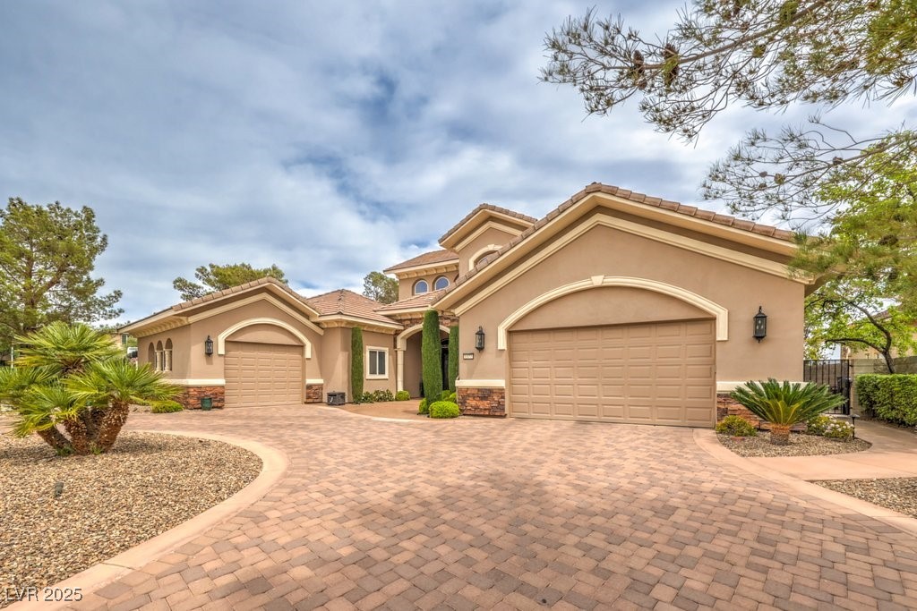 1377 Ruby Sky Court Henderson, NV 89052 - Photo 22 of 61 Mediterranean / spanish home featuring a garage, s