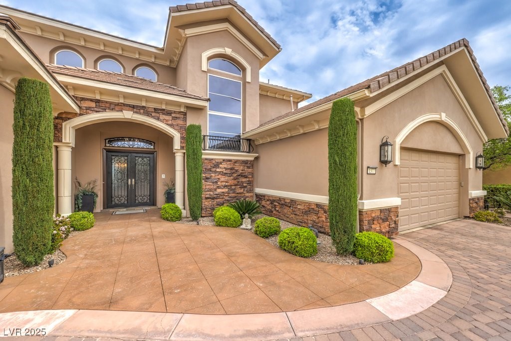 1377 Ruby Sky Court Henderson, NV 89052 - Photo 23 of 61 Entrance to property featuring french doors, an at