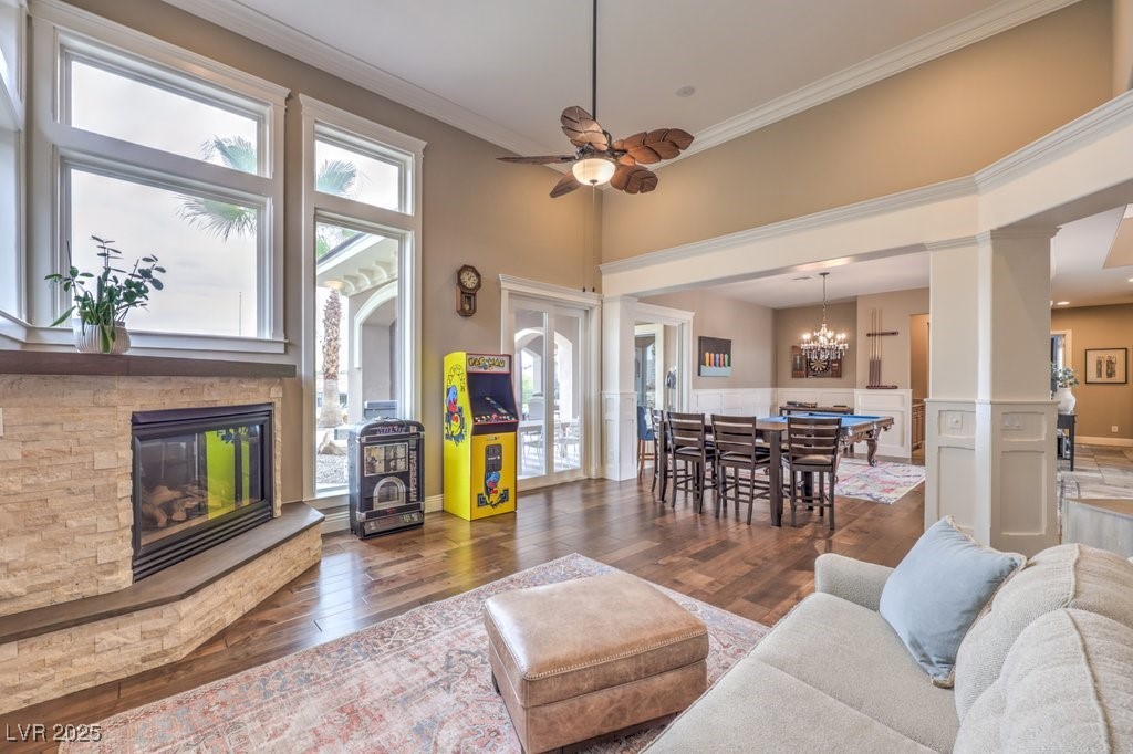 1377 Ruby Sky Court Henderson, NV 89052 - Photo 29 of 61 Living room featuring a fireplace, crown molding,