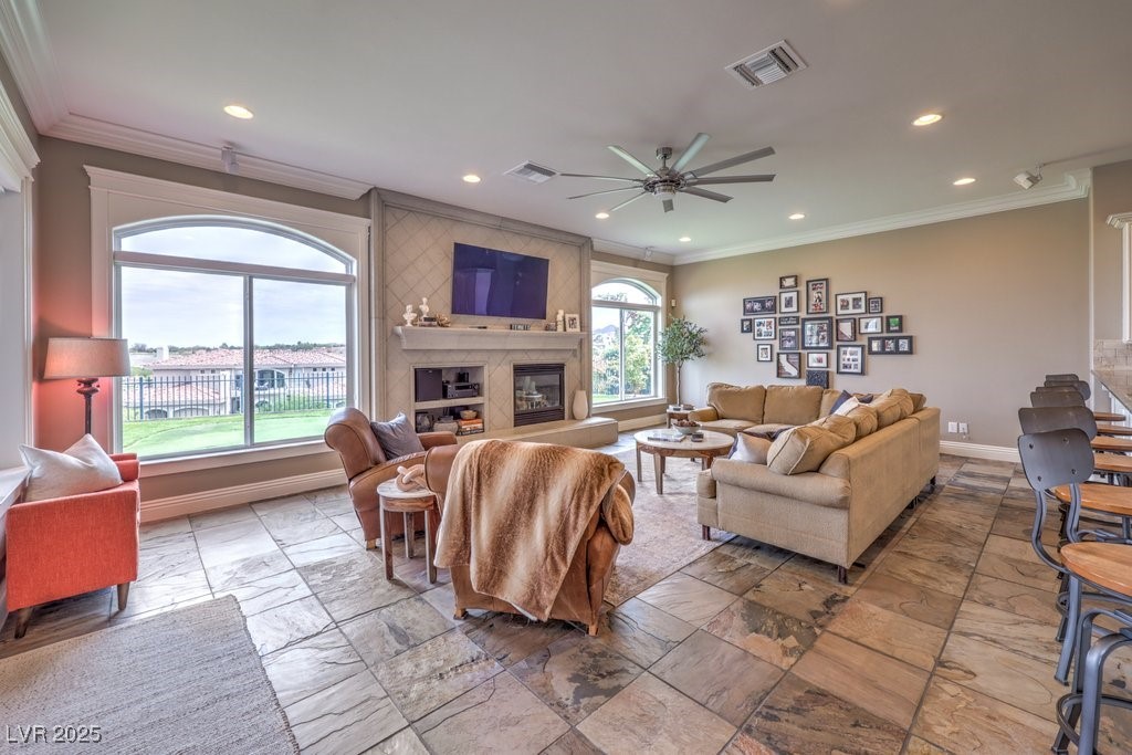 1377 Ruby Sky Court Henderson, NV 89052 - Photo 39 of 61 Living room with ornamental molding, and recessed