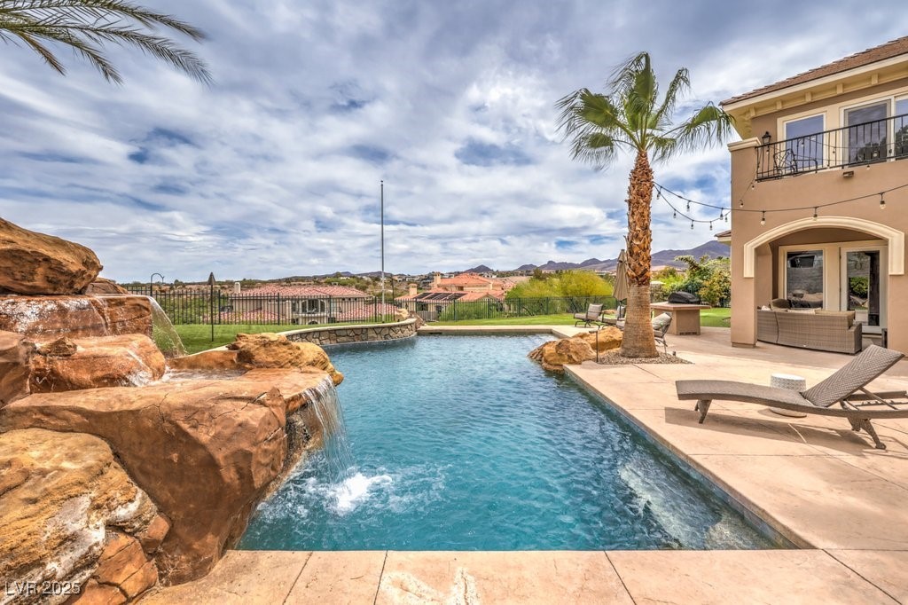1377 Ruby Sky Court Henderson, NV 89052 - Photo 60 of 61 Salt water Pool with Waterfall