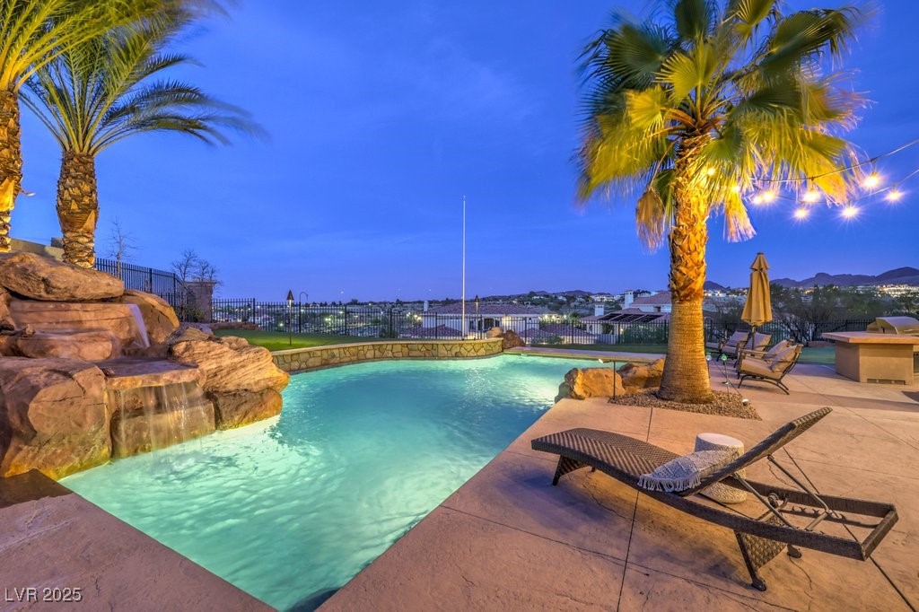1377 Ruby Sky Court Henderson, NV 89052 - Photo 7 of 61 Outdoor pool with a patio