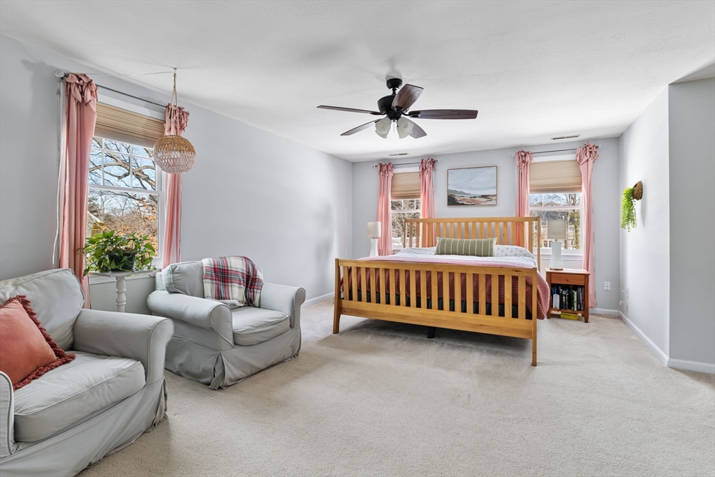 3 Independence Circle Beverly, MA 01915 - Photo 14 of 31 a bedroom with furniture and a window