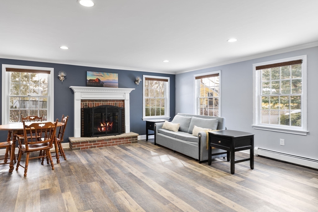 3 Independence Circle Beverly, MA 01915 - Photo 25 of 31 a living room with furniture and a fireplace