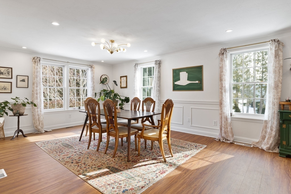 3 Independence Circle Beverly, MA 01915 - Photo 7 of 31 a view of a dining room with furniture window and wooden floor