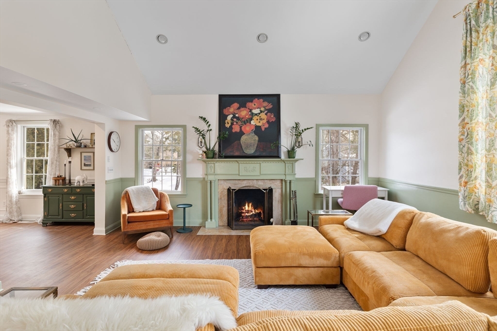 3 Independence Circle Beverly, MA 01915 - Photo 9 of 31 a living room with furniture and a fireplace