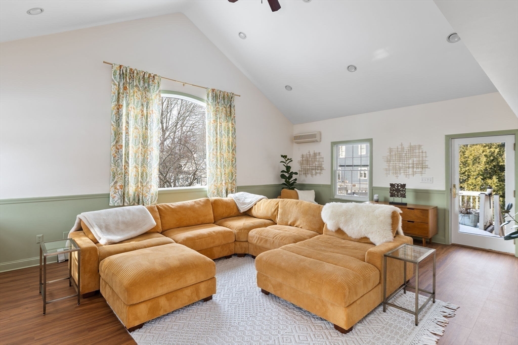 3 Independence Circle Beverly, MA 01915 - Photo 10 of 31 a living room with furniture and a large window