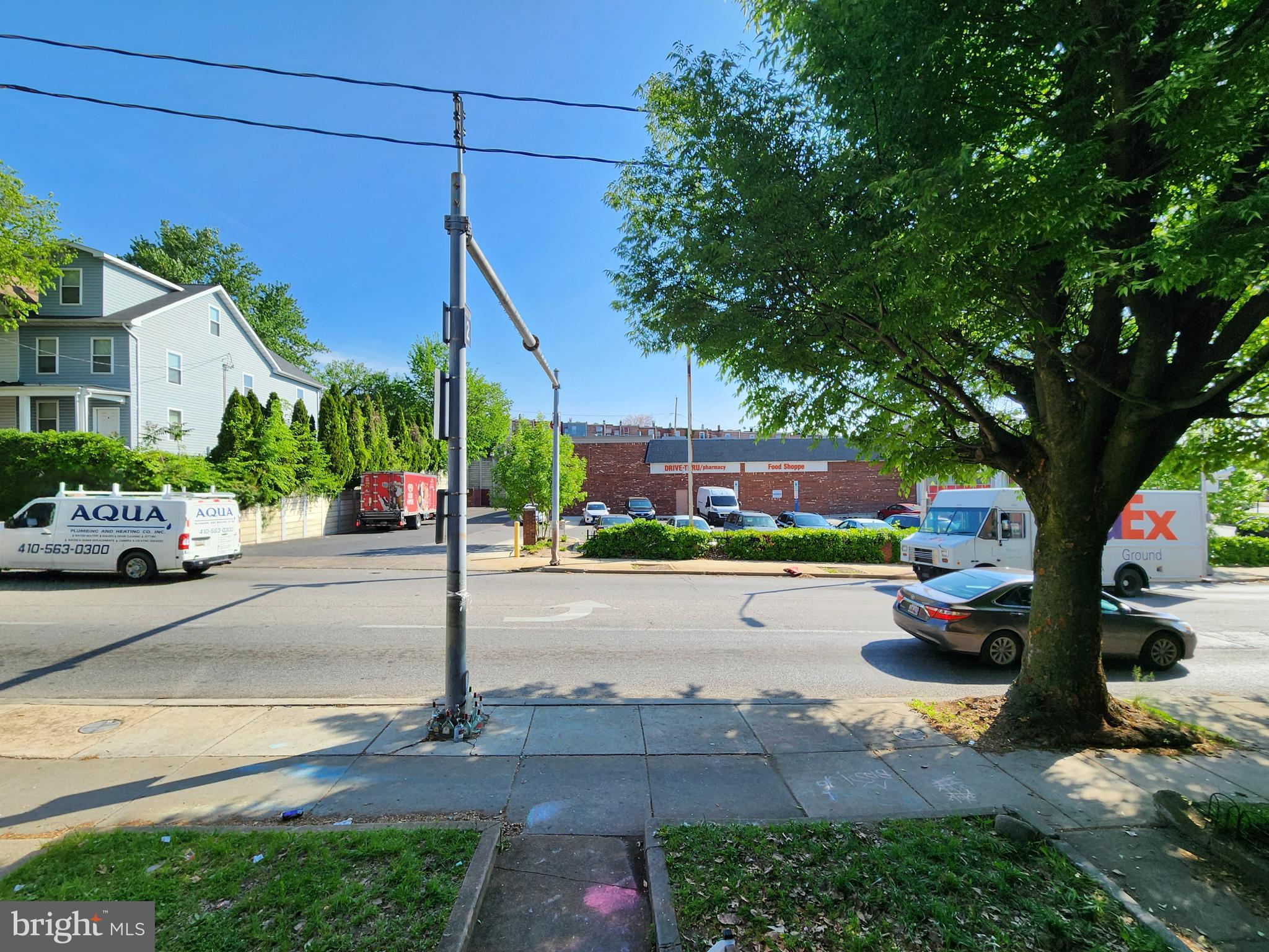 3017 Erdman Avenue Baltimore, MD 21213 - Photo 11 of 13 a view of a street with houses on the side