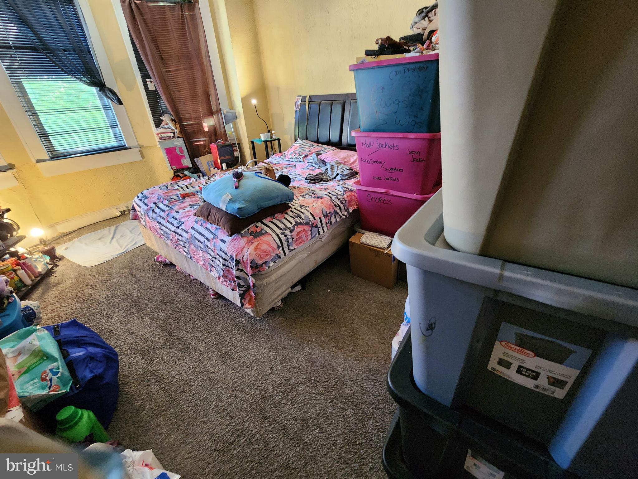 3017 Erdman Avenue Baltimore, MD 21213 - Photo 9 of 13 a living room with furniture and a window