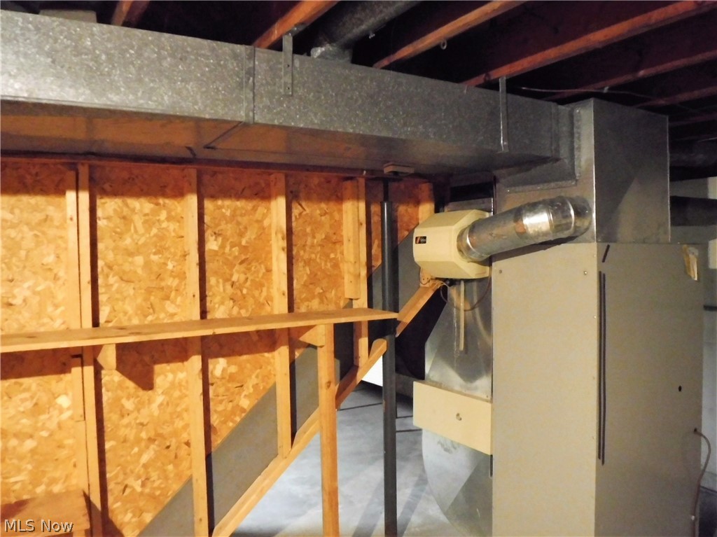 16704 Shedd Road Middlefield, OH 44062 - Photo 23 of 30 Another area downstairs where the furnace is.