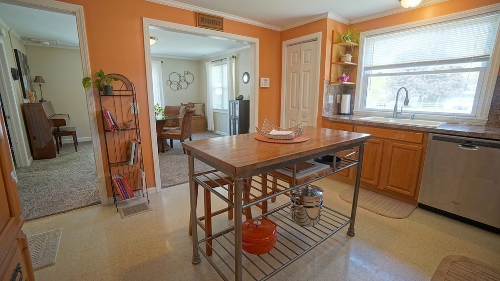 245 Fair Oak Road Springfield, MA 01128 - Photo 12 of 37 a dining room with furniture and window