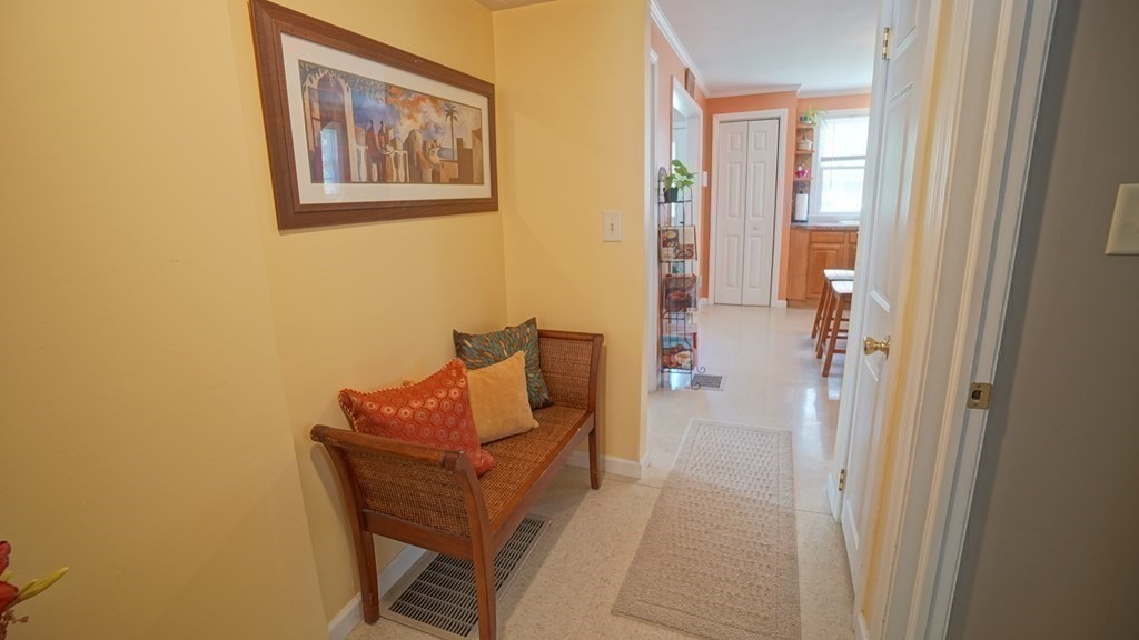 245 Fair Oak Road Springfield, MA 01128 - Photo 16 of 37 a living room with furniture and a gate