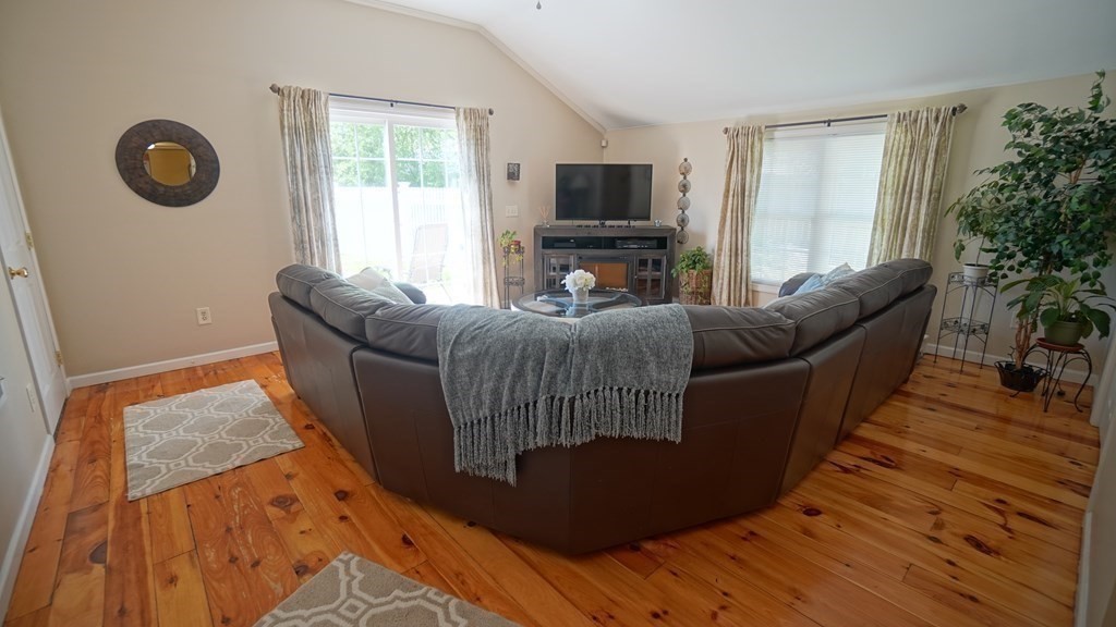245 Fair Oak Road Springfield, MA 01128 - Photo 19 of 37 a living room with furniture and a flat screen tv