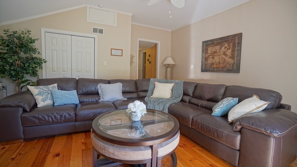 245 Fair Oak Road Springfield, MA 01128 - Photo 21 of 37 a living room with furniture and a painting