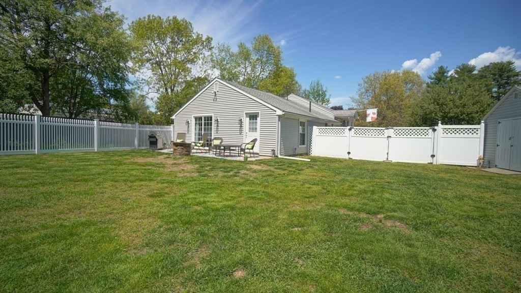 245 Fair Oak Road Springfield, MA 01128 - Photo 27 of 37 a view of a house with a backyard