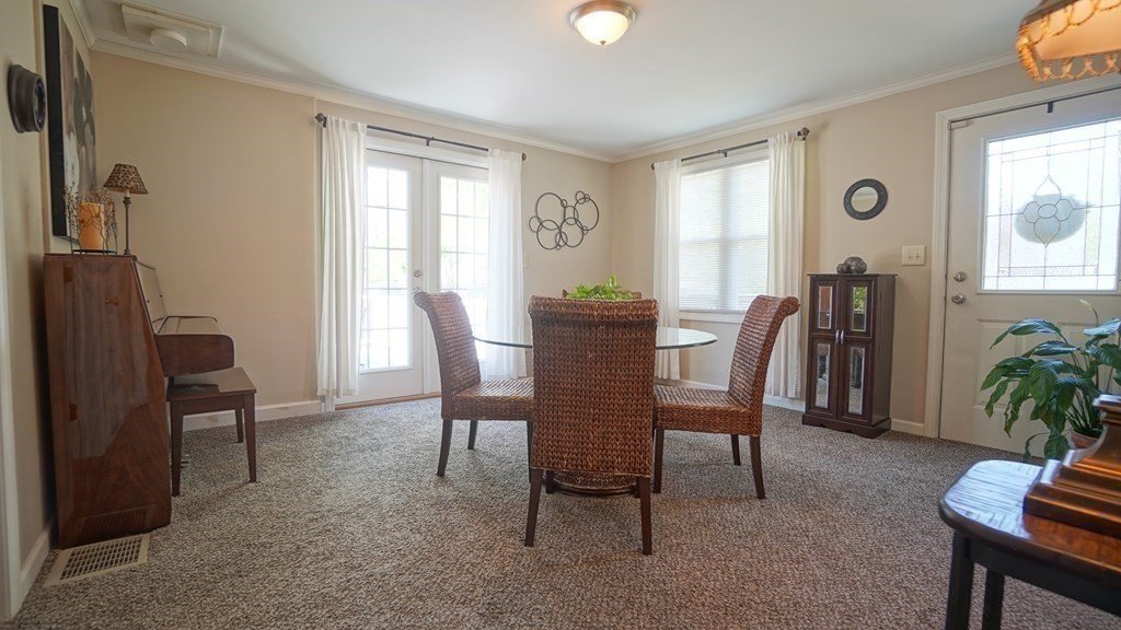 245 Fair Oak Road Springfield, MA 01128 - Photo 7 of 37 a view of a dining room with furniture window and outside view