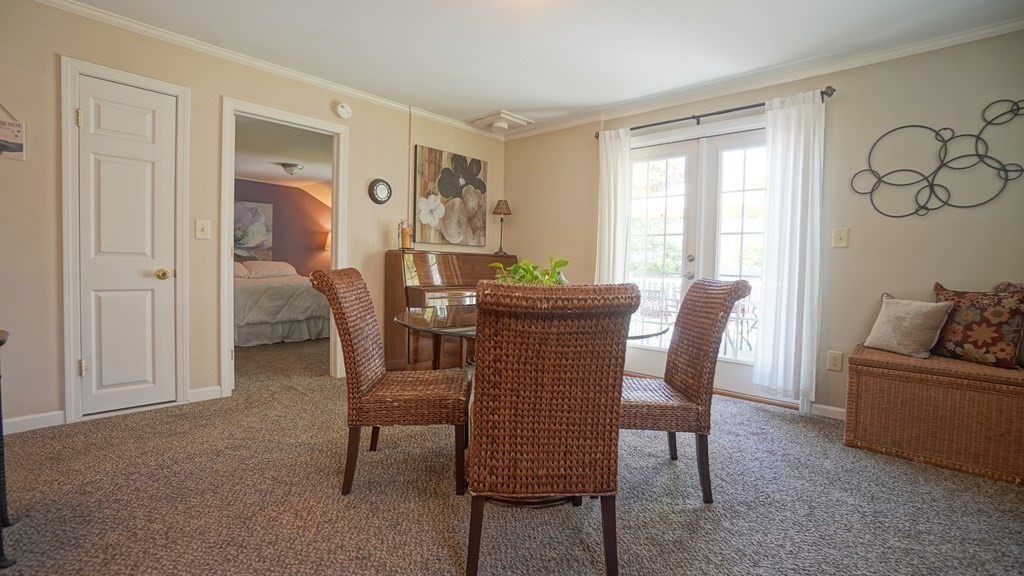 245 Fair Oak Road Springfield, MA 01128 - Photo 8 of 37 a dining room with furniture and window