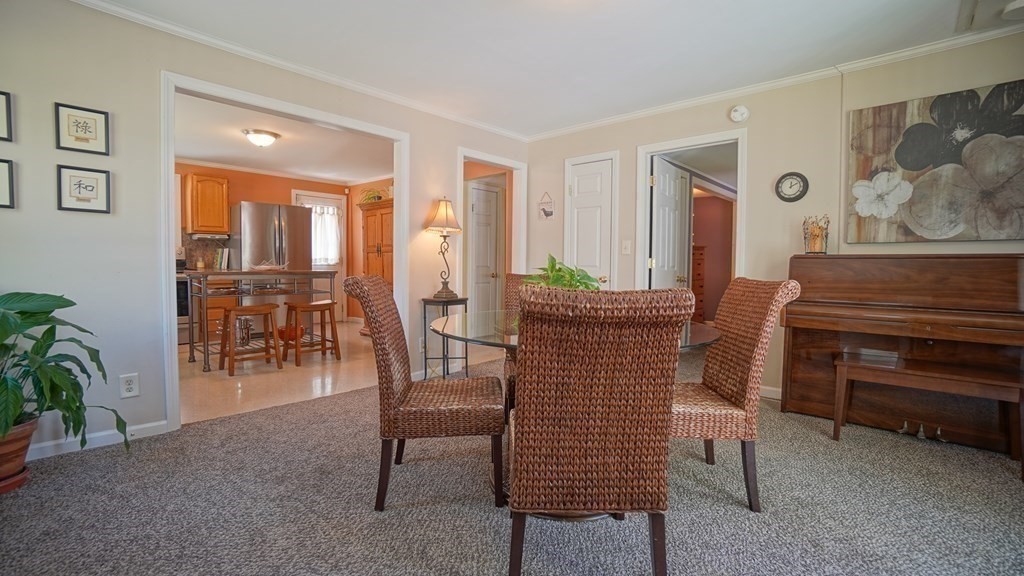 245 Fair Oak Road Springfield, MA 01128 - Photo 9 of 37 a dining room with furniture and entryway
