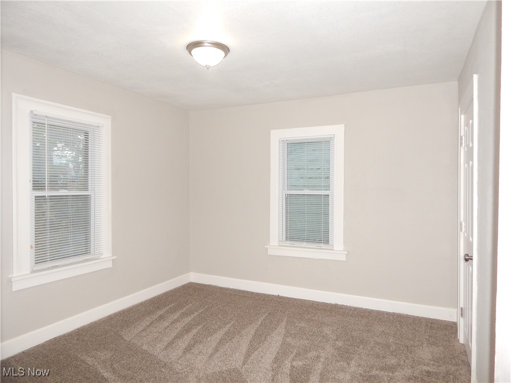 3845 Summit Park Road Cleveland Heights, OH 44121 - Photo 9 of 15 Carpeted bedroom featuring baseboards
