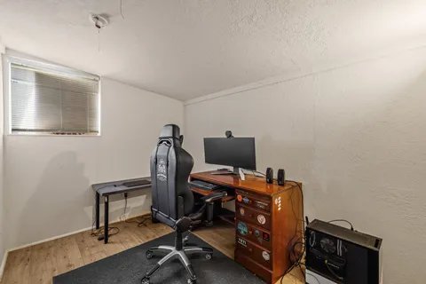 a view of a workspace with furniture