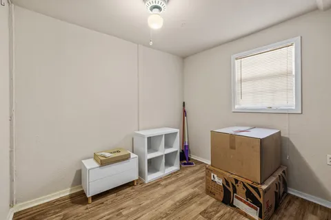 a room with furniture and window