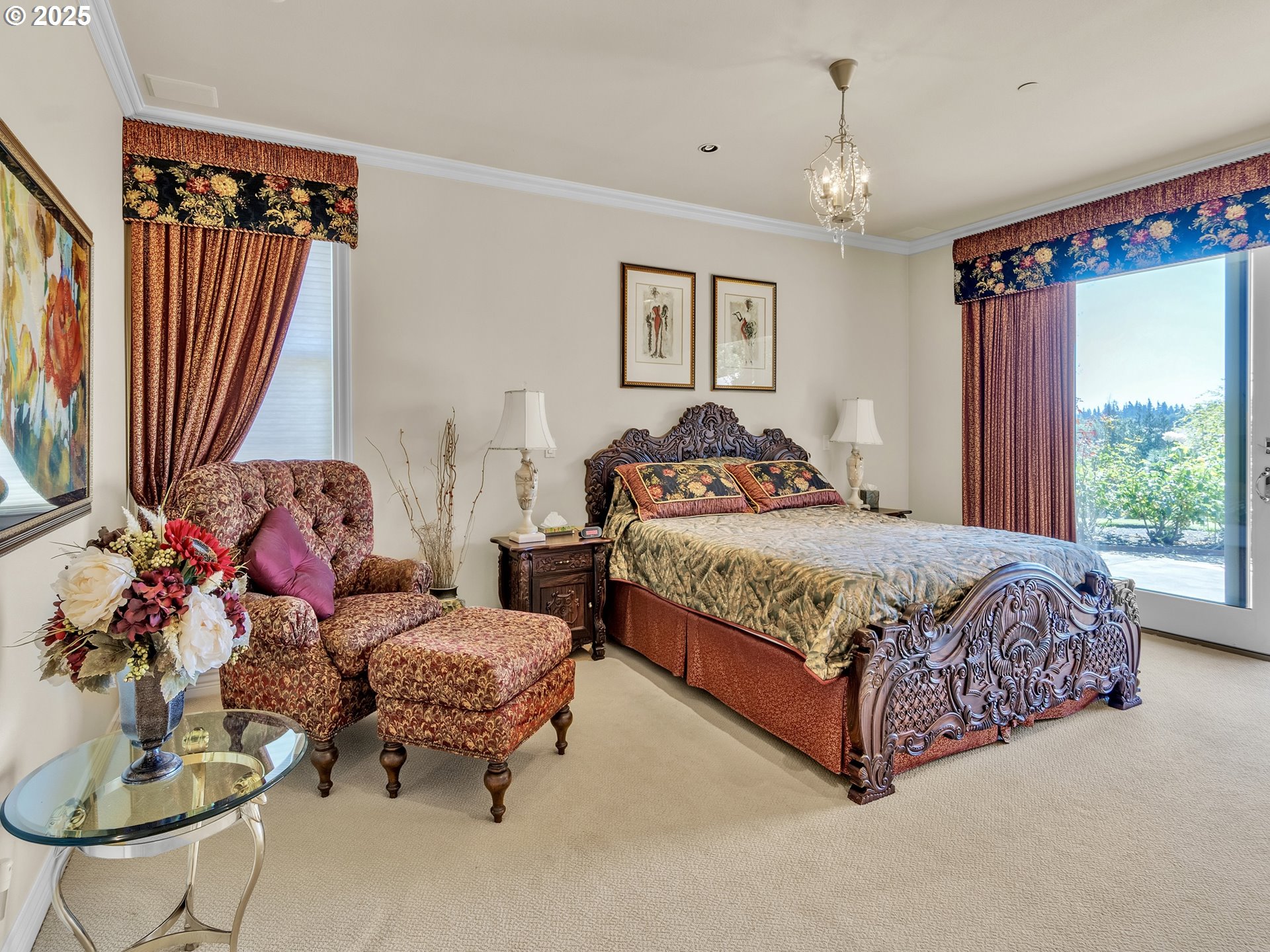 13424 Ehlen Road Northeast Aurora, OR 97002 - Photo 14 of 48 a bedroom with a bed and a chandelier