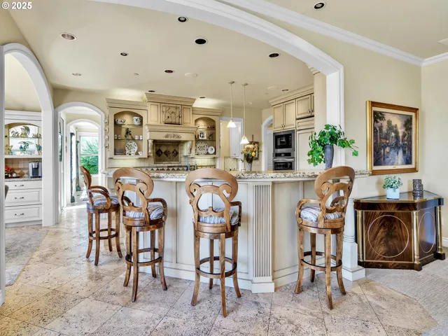 a view of a kitchen with furniture and a fireplace