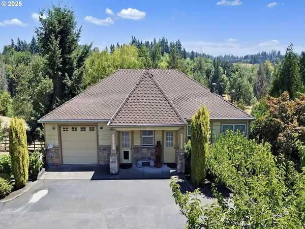 a house with trees in the background