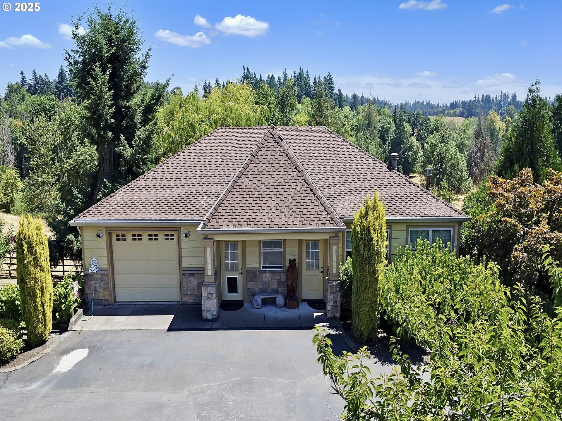 13424 Ehlen Road Northeast Aurora, OR 97002 - Photo 3 of 48 a house with trees in the background