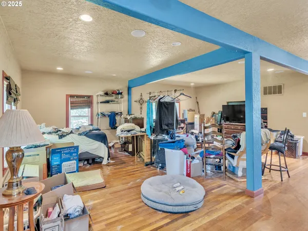 a kitchen that has a lot of cabinets in it and a window