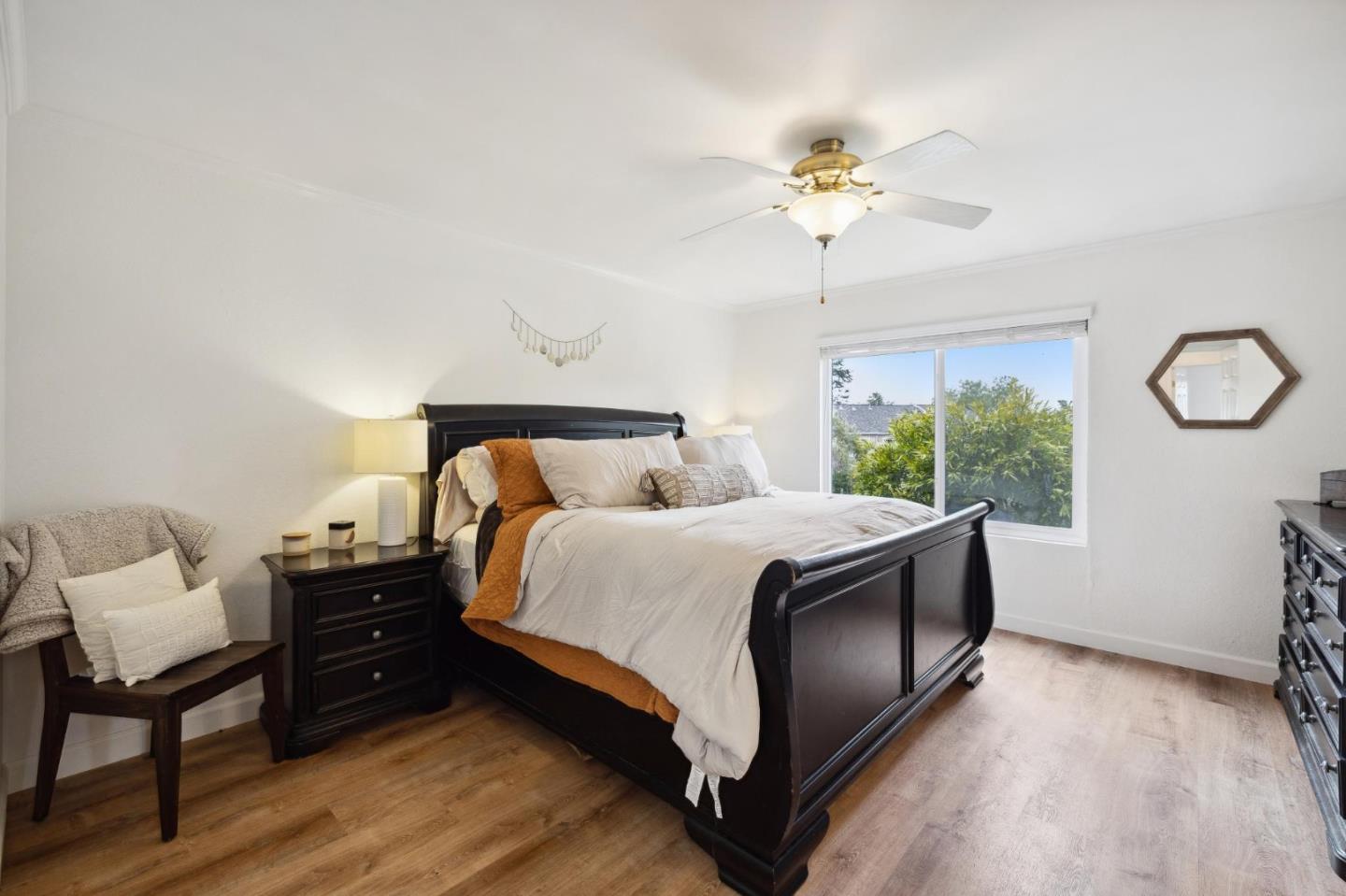 1287 Rosita Road Pacifica, CA 94044 - Photo 35 of 76 a bedroom with a beds and a chandelier