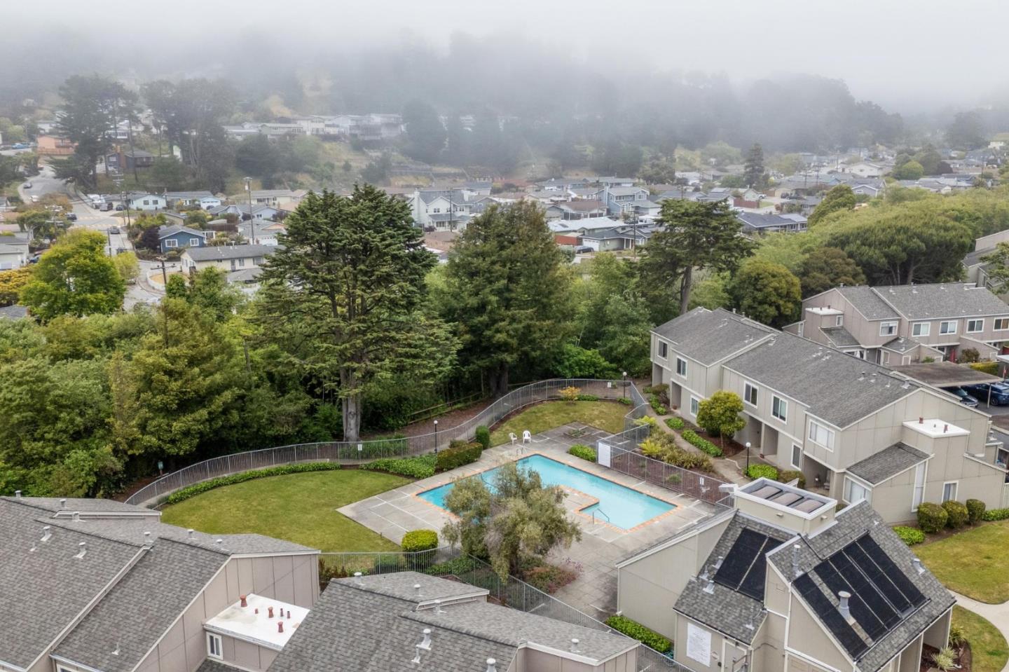 1287 Rosita Road Pacifica, CA 94044 - Photo 4 of 76 an aerial view of a house with a swimming pool