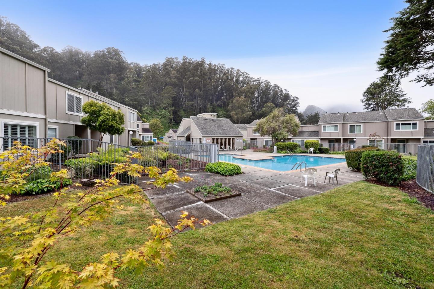 1287 Rosita Road Pacifica, CA 94044 - Photo 49 of 76 a view of a house with backyard and sitting area
