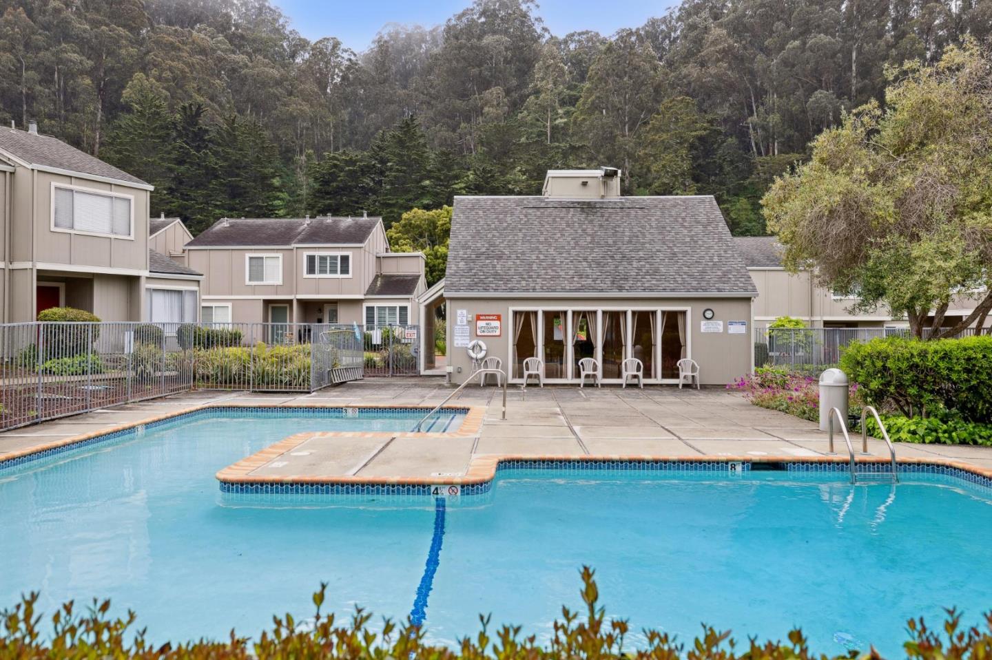 1287 Rosita Road Pacifica, CA 94044 - Photo 51 of 76 a aerial view of a house with swimming pool