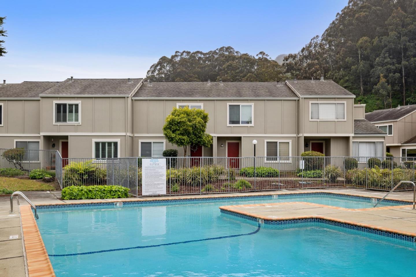 1287 Rosita Road Pacifica, CA 94044 - Photo 53 of 76 a front view of a house with a yard