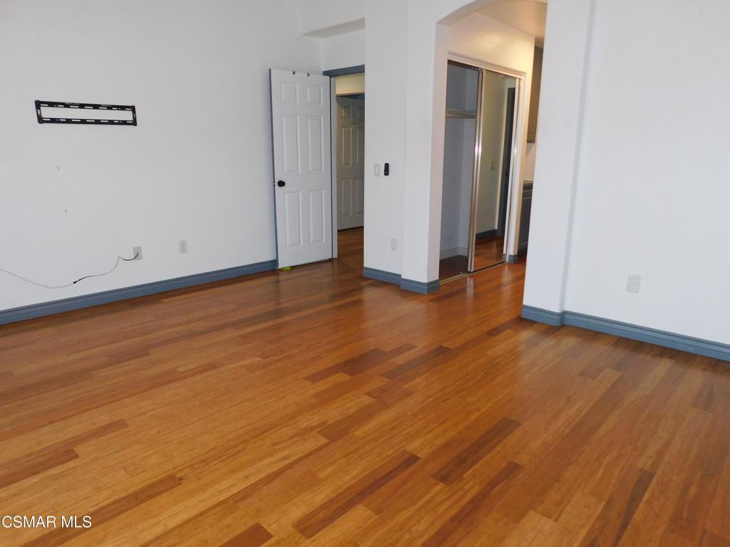 728 Navito Way Oxnard, CA 93030 - Photo 23 of 43 a view of a room with wooden floor