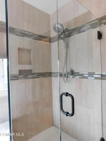 a close view of a shower in bathroom