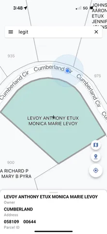 a view of a swimming pool with a yard and lake view