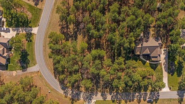 a view of road with trees