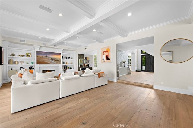 a view of a living room and dining room
