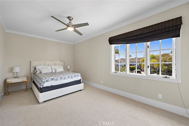 a view of a terrace with a table and chairs