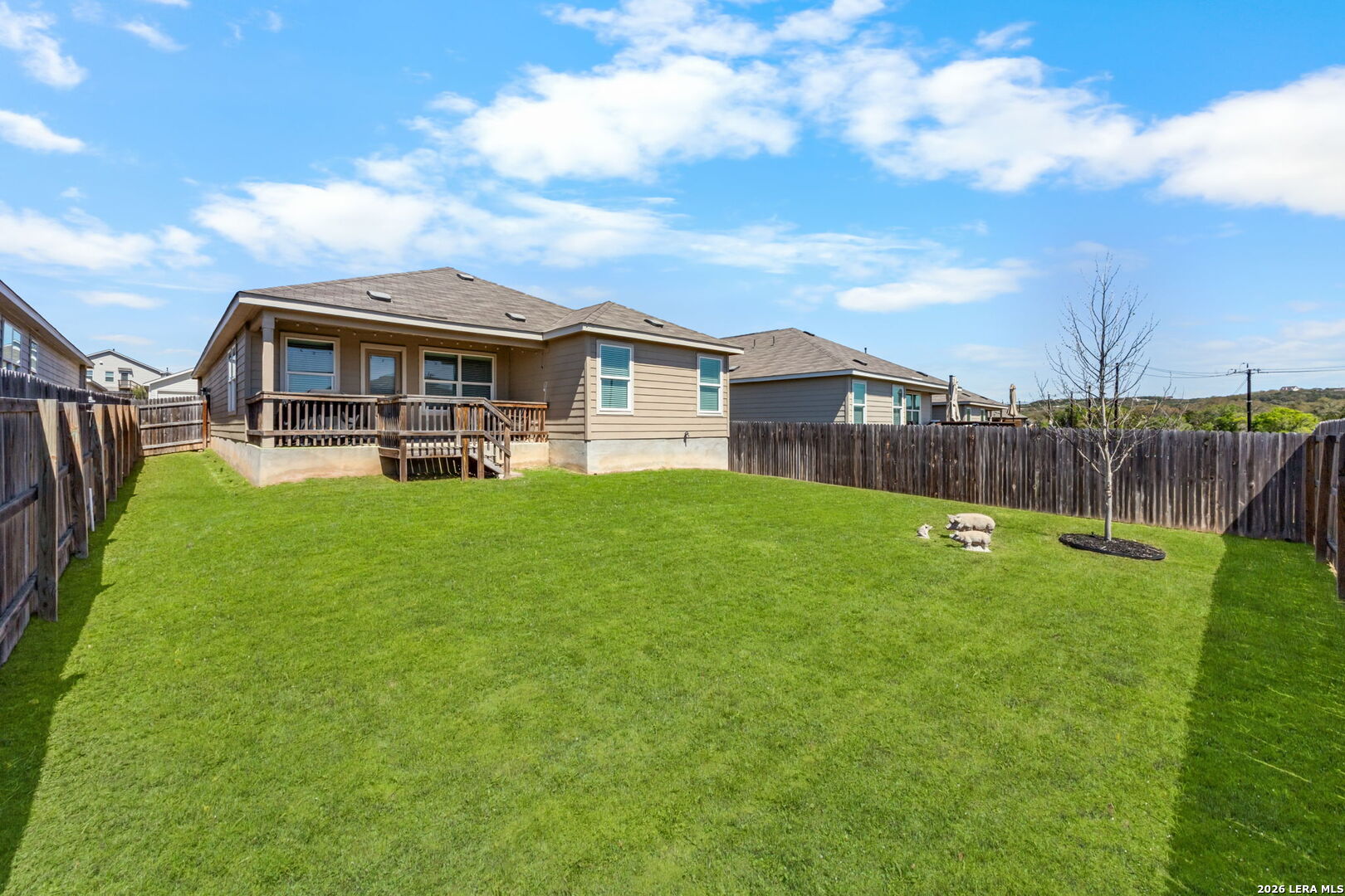 5781 Companion Loop Bulverde, TX 78163 - Photo 17 of 21 a view of a house with a yard and sitting area