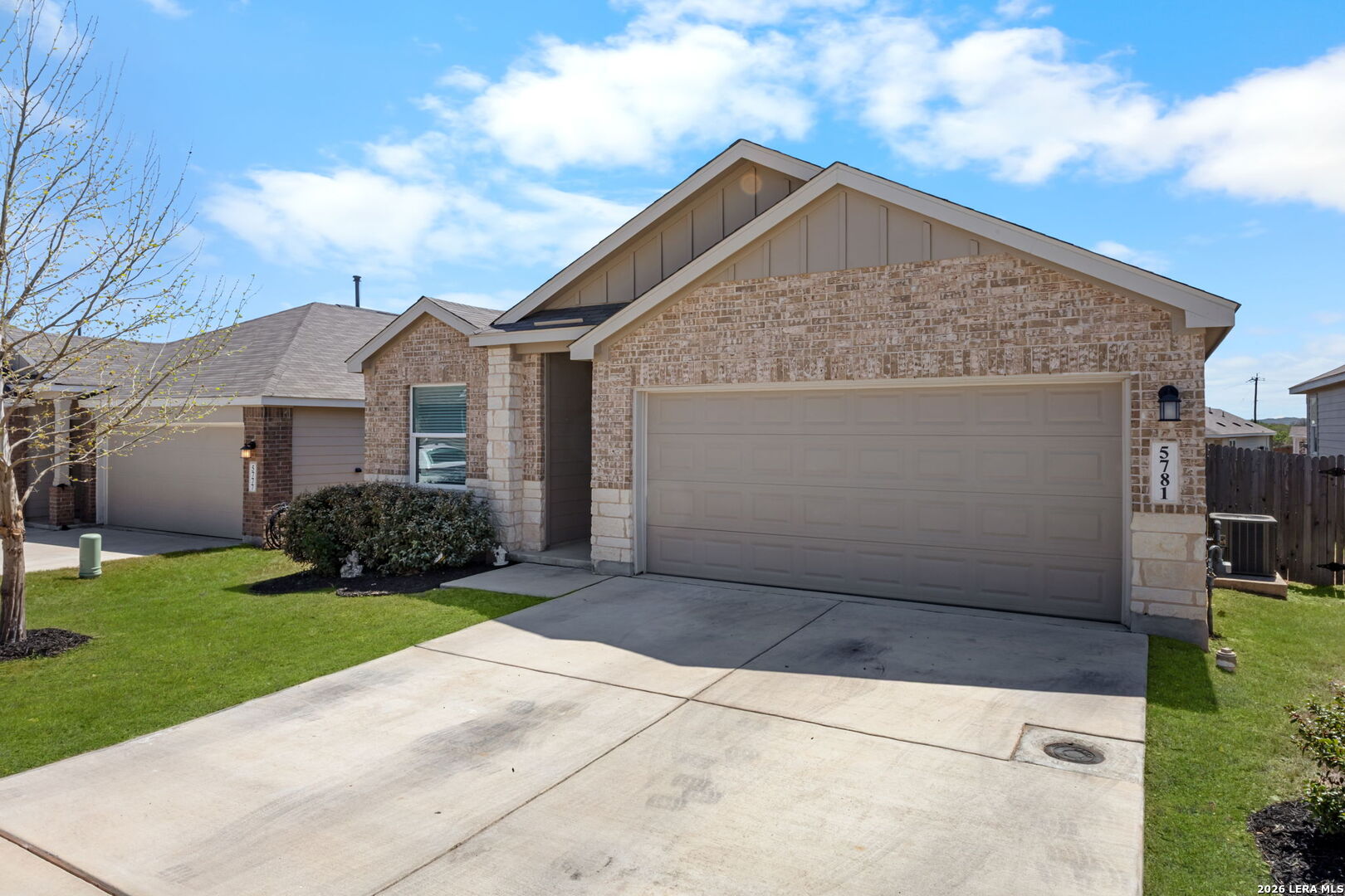 5781 Companion Loop Bulverde, TX 78163 - Photo 19 of 21 a front view of a house with a yard