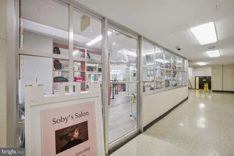 a view of living room with furniture and flat screen tv