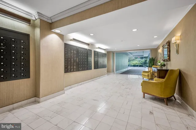 a view of a livingroom with furniture and windows